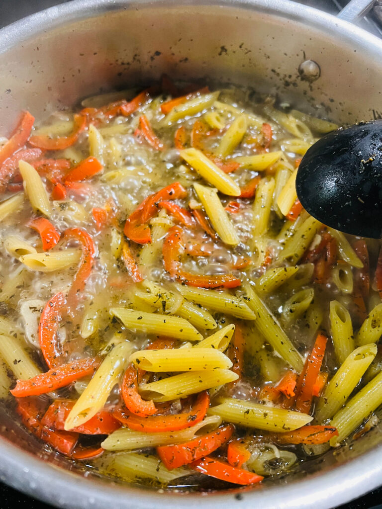 one-pot creamy sun-dried tomato pasta -- penne cooking