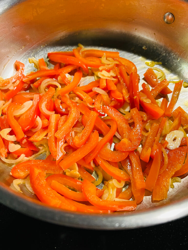 one-pot creamy sun-dried tomato pasta -- peppers and shallot saute